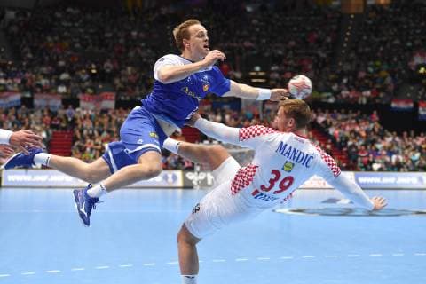 Omar Ingi MAGNUSSON ISL action duel against David MANDIC CRO preliminary round group B Iceland ISL Croatia CRO 27 31 on 11 01 2019 in Munich Germany Olympic Hall Handball World Championship 2019 from 10 01 27 01 2019 in Germany and Denmark