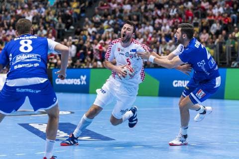 Munich Germany 11 January 2019 World Cup 2019 Men Group B Island vs Croatia v li Bjarki Elisson Island Domagoj Duvnjak Croatia THW Kiel Olafur Gustafsson Island Munich Olympic Hall Bavaria Germany