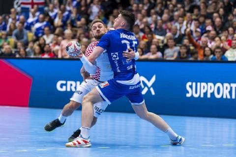 Munich Germany 11 January 2019 World Cup 2019 Men Group B Island vs Croatia v left in duel Luka Cindric Croatia Elvar Orn Jonsson Island Munich Olympic Hall Bayern Germany