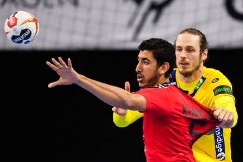 190111 Karim Abdelrahim of Egypt and Linus Persson of Sweden during the IHF World Handball Championship match between Egypt and Sweden on January 11 2019 in Copenhagen Photo Ludvig Thunman BILDBYR u0081N kod LT 35574, detectedSourceLanguage  Copyright: LUDVIGxTHUNMAN BB190111LT045
