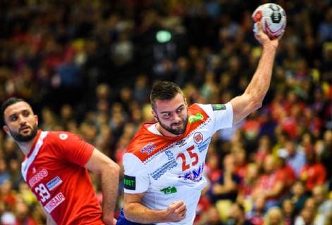 190111 Mohamed Soussi of Tunisia and Eivind Tangen of Norway during the 2019 IHF World Championship match between Tunisia and Norway on January 11 2019 in Herning Photo Jon Olav Nesvold BILDBYR u0081N kod JE 160394, detectedSourceLanguage  Copyright: JONxOLAVxNESVOLD BB190111JE111