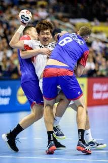Russia vs Korea Handball World Championship 2019 12 01 2019 l r Dmitrii Zhitnikov RUS 89 Dongmyung Kim COR 15 and Egor Evdokimov RUS 8 at the match between Russia and Korea at the Handball World Championship in Berlin on 12 01 2019 Berlin BER Germany Mercedes Benz Arena