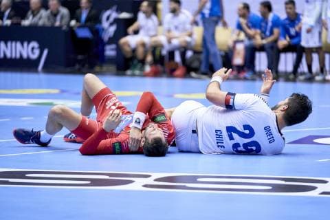 Handball WM, Österreich - Chile Dominik Schmid (6) of Austria and Marco Oneto (29) of Chile during the men s IHF Handball World Championship WM Weltmeisterschaft Group C match 16, between Austria and Chile. Herning Denmark on Saturday Jan 12 2019 Herning Denmark, Denmark 