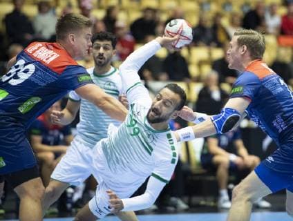 Abbas Alsaffar of Saudi Arabia is stopped by Espen Lie Hansen of Norway during the men s IHF Handball World Championship Group C match between Norway and Saudi Arabia in Herning Denmark Saturday Jan 12 2019 Herning Jylland Denmark, detectedSourceLanguage  Copyright: HenningxBagger HenningxBaggerx COP110 spdk20190112-181020-L