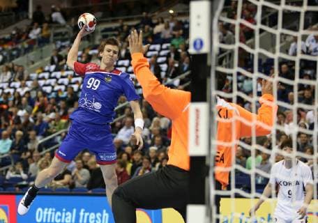 12 01 2019 Handball IHF World Championship Denmark and Germany 2019 Preliminary round Group A Russia Korea in the Mercedes Benz Arena Berlin L R Sergei Mark Kosorotov Russia against goalkeeper Jaeyong Park Korea