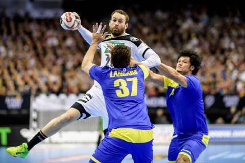 Germany vs Brazil Handball World Championship 2019 12 01 2019 Steffen Faeth GER 23 against Haniel Langaro BRA 37 and Thiagus Petrus Santos BRA 14 at the match between Germany and Brazil at the Handball World Championship in Berlin on 12 01 2019 Berlin BER Germany Mercedes Benz Arena