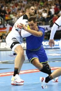 Hendrik Pekeler Germany vs. Guilherme Valadao Brazil in the match Germany vs. Brazil the Handball World Championship 2019 the Men on 12 01 2019 at the Mercedes Benz Arena in Berlin Handball World Championship 2019 Group A Germany Brazil