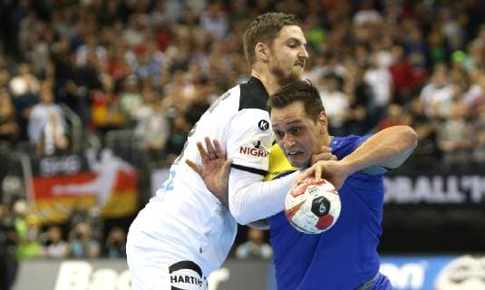 Hendrik Pekeler Germany vs. Guilherme Valadao Brazil in the match Germany vs. Brazil the Handball World Championship 2019 the Men on 12 01 2019 at the Mercedes Benz Arena in Berlin Handball World Championship 2019 Group A Germany Brazil