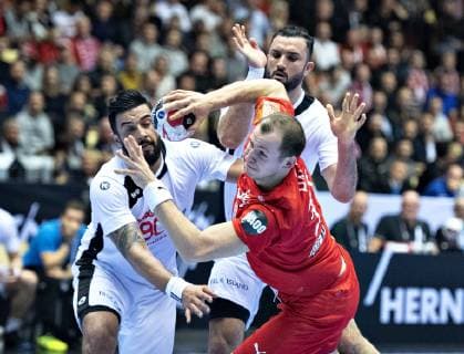 Simon Hald Jensen of Denmark against Marouan Chouiref of Tunisia during the mens IHF Handball World Championship Group, detectedSourceLanguage  Copyright: HenningxBagger HenningxBaggerx COP101 spdk20190112-205409-L