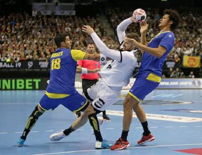 12 01 2019 Handball IHF World Championship Denmark and Germany 2019 preliminary round Group A Germany Brazil in the Mercedes Benz Arena Berlin L R Felipe Borges Brazil against Hendrik Pekeler Germany and Petrus Thiagus Santos Brazil