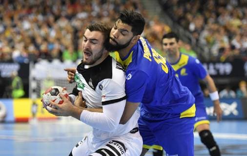 Jannik Kohlbacher Germany with ball right Thiago Ponciano BRA Germany Brazil Germany Brasilia France IHF Handball World Championship 2019 Hanball World Championship 2019 Men Men Men Handball men Handball Germany Germany Preliminary Round Group A group A Berlin 12 1 2019