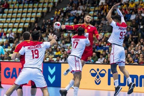 Munich Germany 13 January 2019 World Cup 2019 Men Group B Macedonia vs Bahrain vs Stojanche Stoilov Macedonia Mohamed Merza Bahrain bah17 Filip Kuzmanovski Macedonia Mohamed Habib Bahrain Munich Olympic Hall Bavaria Germany