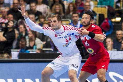 Munich Germany 13 January 2019 World Cup 2019 Men Group B Croatia vs Japan v left in duel Kresimir Kozina Croatia Goeppingen Tetsuya Kadoyama Japan Munich Olympic Hall Bayern Germany