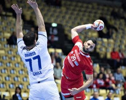 Mohamed Soussi of Tunisia against Victor Donoso of Chile during the men s IHF Handball World Championship Group C match between Tunisia and Chile in Herning Denmark on Monday Jan 14 2019 Herning Jylland, detectedSourceLanguage  Copyright: HenningxBagger HenningxBaggerx COP109 spdk20190114-154513-L