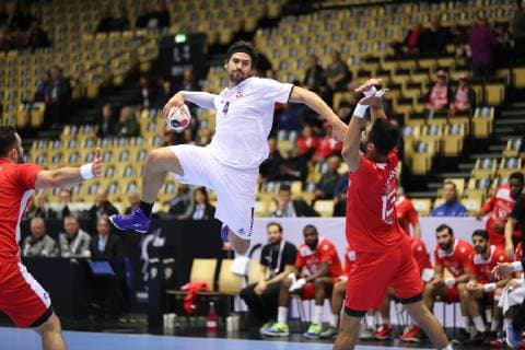 26th Mens Handball World Championship Tunisia vs Chile 14 01 19 Erwin Feuchtmann Chile 04 GegenOussama Hosny Tunisia 13 xmmkx