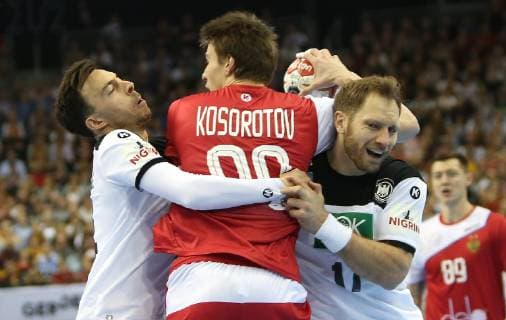 Patrick Groetzki l and Steffen Weinhold Germany re stop Sergei Mark Kosorotov Russia at the match Russia vs. Germany of the Handball World Championship 2019 of Men on 14 01 2019 in the Mercedes Benz Arena in Berlin Handball World Championship 2019 Group A Germany Russia Russia