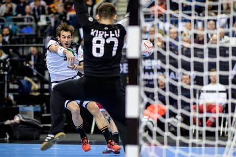 Germany vs Russia Handball World Championship 2019 14 01 2019 Uwe Gensheimer GER 3 with a goal against Victor Kireev RUS 87 at the match between Russia and Germany at the Handball World Championship in Berlin on 14 01 2019 Berlin BER Germany Mercedes Benz Arena