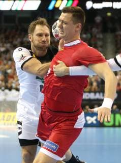 Steffen Weinhold Germany tries to stop Dmitrii Zhitnikov Russia in the match Russia vs. Germany the mens handball world championship 2019 on 14 01 2019 in the Mercedes Benz arena in Berlin handball world championship 2019 group A Germany Russia