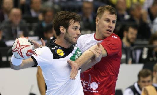 Uwe Gensheimer Germany on the ball Daniil Shishkarev Russia defends Russia against Germany in the mens handball World Championship 2019 on 14 01 2019 in the Mercedes Benz Arena in Berlin Handball World Championship 2019 Group A Germany Russia