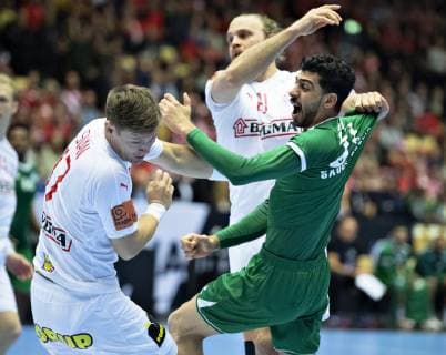 Mojtaba Alsalem of Saudi Arabia is stopped during the men s IHF Handball World Championship Group C match between Denmark and Saudi Arabia in Herning Denmark on Monday Jan 14 2019 Herning Jylland Denmark, detectedSourceLanguage  Copyright: HenningxBagger HenningxBaggerx COP101 spdk20190114-201823-L