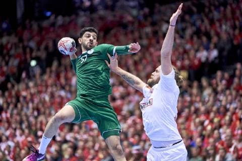 IHF Men s World Championship WM Weltmeisterschaft 2019 Group C handball match. Mojtaba Alsalem (57) of Saudi Arabia and Henrik Mollgaard (21) of Denmark during the men s IHF Handball World Championship Group C match 33 between Denmark and Saudi Arabia at the Jyske Bank Boxen arena in Herning Denmark on Monday January 14, 2019. Denmark 