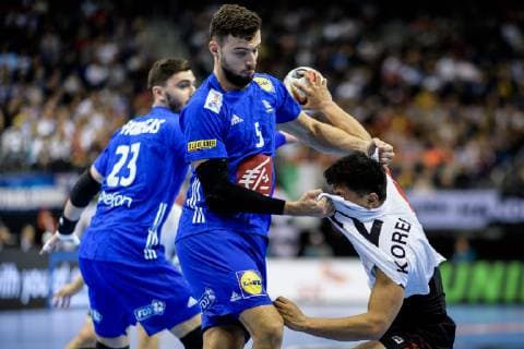 France vs. Korea Handball World Championship 2019 14 01 2019 Nedim Remili FRA 5 and Kyong Song Ri COR 2 at the match between France and Korea at the Handball World Championship in Berlin on 14 01 2019 Berlin BER Germany Mercedes Benz Arena