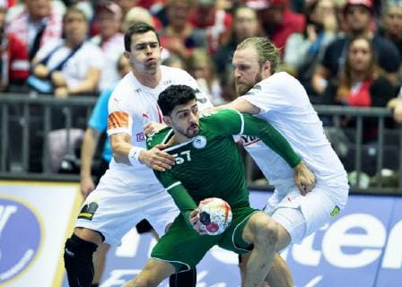 Mojtaba Alsalem of Saudi Arabia is being held by Henrik Moellgaard and Rasmus Lauge of Denmark during the men s IHF Handball World Championship Group C match between Denmark and Saudi Arabia in Herning Denmark on Monday Jan 14 2019 Herning Jylland Denmark, detectedSourceLanguage  Copyright: HenningxBagger HenningxBaggerx COP101 spdk20190114-221209-L