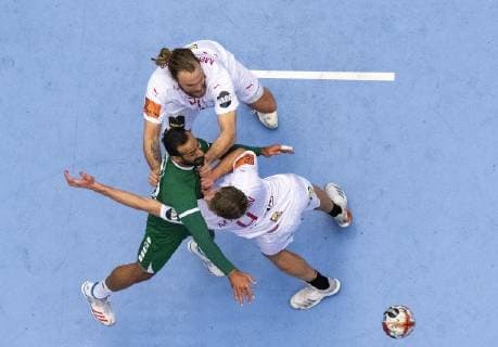 January 14, 2019 - Herning, Denmark - Henrik Moelgaard (21), Denmark, Abbas Alsaffar (99), Saudi Arabia and Magnus Landin (4), Denmark in close fight about the ball during the group C handball match between Denmark-Saudi Arabia in Jyske Bank Boxen in Herning during the 2019 IHF Handball World Championship WM Weltmeisterschaft in Germany Denmark. Handball 2019: Denmark-Saudi Arabia - ZUMAm173 20190114_zsp_m173_006 Copyright: xLarsxMoellerx