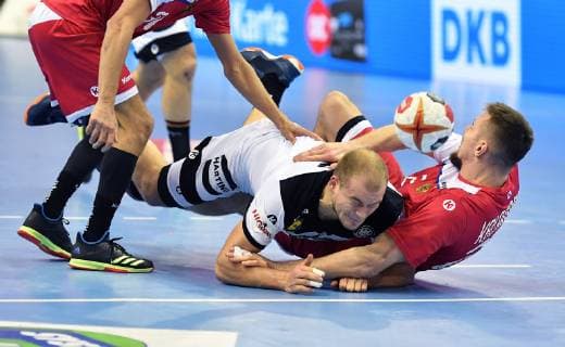 Paul Drux Germany in duel with Egor Evdokimov Russia Russia Russia Germany Russia Germany IHF Handball World Championship 2019 Hanball World Championship 2019 Men Men Men Men Handball Germany Germany Preliminary Round Group A group A Berlin 14 1 2019