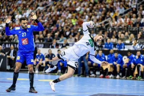 Germany vs. France Handball World Championship 2019 15 01 2019 Hendrik Pekeler GER 13 and Adrien Dipanda FRA 27 at the match between Germany and France at the Handball World Championship in Berlin on 15 01 2019 Berlin BER Germany Mercedes Benz Arena