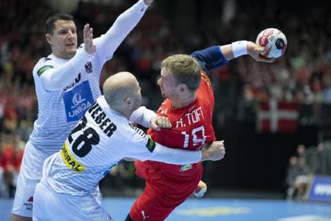 Rene Toft Hansen of Denmark against Robert Weber of Austria during the mens IHF Handball World Championship Group C match between Austria and Denmark in Herning Denmark on Tuesday Jan 15 2019 Herning Jutland Denmark, detectedSourceLanguage  Copyright: HenningxBagger HenningxBaggerx COP101 spdk20190115-205441-L
