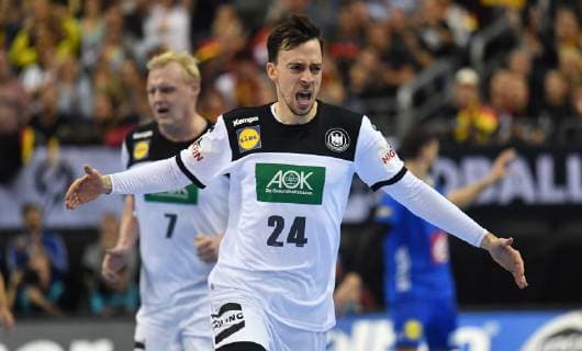 Patrick Groetzki Germany cheers for goal behind Patrick Wiencek Germany Germany France Germany France IHF Handball World Championship 2019 Hanball World Championship 2019 Men Men Men Men Handball Germany Germany Preliminary Round Group A group A Berlin 15 1 2019