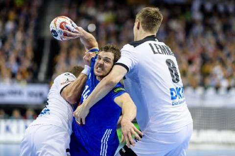 Germany vs France Handball World Championship 2019 15 01 2019 Kentin Mahe FRA 14 against Martin Strobel GER 19 and Finn Lemke GER 6 at the match between Germany and France at the Handball World Championship in Berlin on 15 01 2019 Berlin BER Germany Mercedes Benz Arena