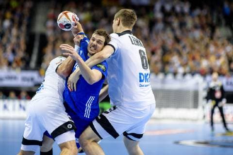 Germany vs France Handball World Championship 2019 15 01 2019 Kentin Mahe FRA 14 against Martin Strobel GER 19 and Finn Lemke GER 6 at the match between Germany and France at the Handball World Championship in Berlin on 15 01 2019 Berlin BER Germany Mercedes Benz Arena