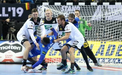Defense of Hendrik Pekeler Germany Patrick Wiencek Germany Fabian Boehm Germany stops Dika Mem France at the match Germany vs France of the Mens Handball World Championship 2019 on 15 01 2019 in the Mercedes Benz Arena in Berlin Handball World Championship 2019 Group A Germany France