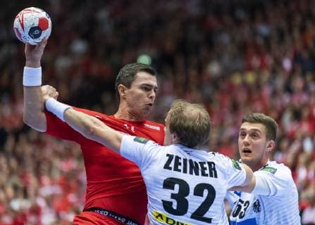 January 15, 2019 - Herning, Denmark - Rasmus Lauge (11), Denmark is fighting for the ball against Gerald Zeiner (32), Austria and Mykola Bilyk (53), Austria during the group C handball match between Austria and Denmark in Jyske Bank Boxen in Herning during the 2019 IHF Handball World Championship WM Weltmeisterschaft in Germany Denmark. Handball 2019: Austria-Denmark - ZUMAm173 20190115_zsp_m173_025 Copyright: xLarsxMoellerx