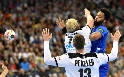 Timothey N Guessan FRA litter front Patrick Wiencek Germany Hendrik Pekeler Germany Germany France Germany France IHF Handball World Championship 2019 Hanball World Championship 2019 men men men Handball Germany Germany preliminary round group A group A Berlin 15 1 2019