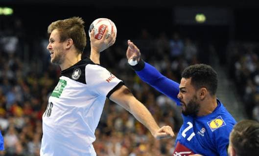 Fabian Böhm Germany at mLitter right Adrien Dipanda FRA Germany France Germany France IHF Handball World Championship 2019 Hanball World Championship 2019 Men Men Men Men Handball Germany Germany Preliminary Round Group A group A Berlin 15 1 2019