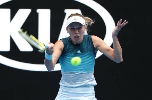 (190116) -- MELBOURNE, Jan. 16, 2019 (Xinhua) -- Caroline Wozniacki of Denmark returns the ball during the women s singles second round match against Johanna Larsson of Sweden at the Australian Open in Melbourne, Australia, Jan. 16, 2018. (Xinhua Bai Xuefei) (SP)AUSTRALIA-MELBOURNE-TENNIS-AUSTRALIAN OPEN 