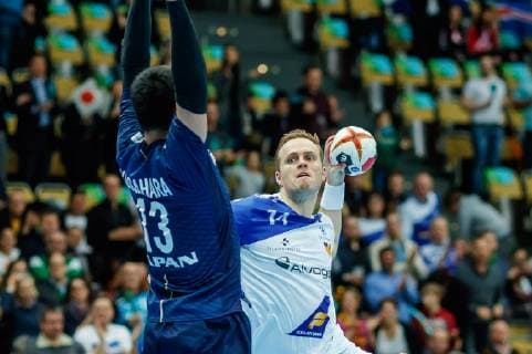 Munich Germany 16 01 2019 IHF Handball WM 2019 Group B Japan Island Kenya Kasahara JPN and Omar Ingi Magnusson ISL in the duel DeFodi048