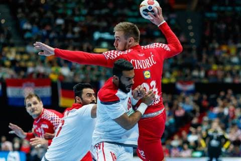 Munich Germany 16 01 2019 IHF Handball WM 2019 Group B Croatia Bahrain Ahmed Dschalal Abbas BHR and Luka Cindric CRO in the total DeFodi048