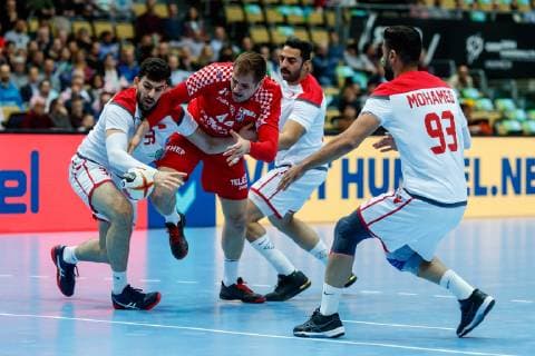 Munich Germany 16 01 2019 IHF Handball WM 2019 Group B Croatia Bahrain Hasan Madan BHR Kresimir Kozina CRO Dschasim Abbas Al Salatna BHR and Mohammed Habib Hasan BHR in the duel DeFodi048