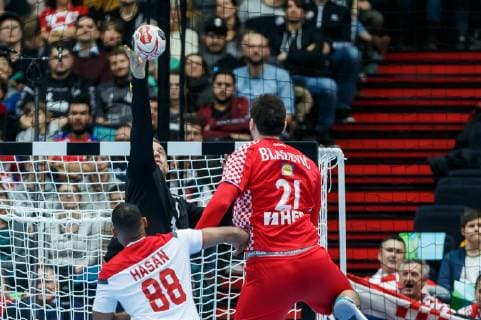 Munich Germany 16 01 2019 IHF Handball WM 2019 Group B Croatia Bahrain Hasan Alfardan BHR Goalkeeper Ivan Stevanovic CRO and Alen Blazevic CRO in the total DeFodi048