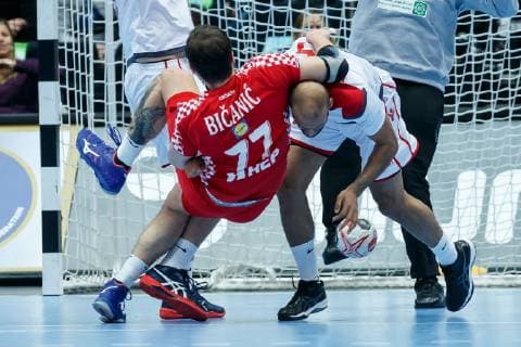 Munich Germany 16 01 2019 IHF Handball WM 2019 Group B Croatia Bahrain Damir Bicanic CRO and Mohamed Abdulredha BHR in the total DeFodi048