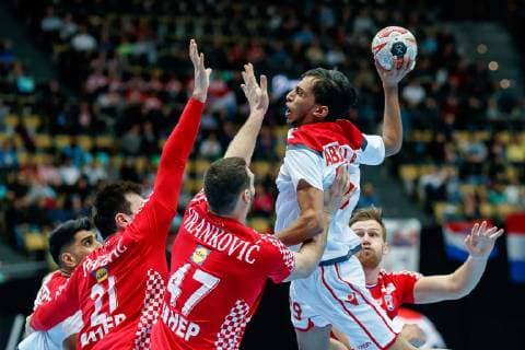 Munich Germany 16 01 2019 IHF Handball WM 2019 Group B Croatia Bahrain Jakov Vrankovic CRO and Abdulla Yaseen BHR in the total DeFodi048