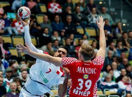 Munich Germany 16 01 2019 IHF Handball WM 2019 Group B Croatia Bahrain Ali Mersa BHR and David Mandic CRO in the total DeFodi048