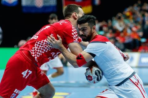 Munich Germany 16 01 2019 IHF Handball WM 2019 Group B Croatia Bahrain Jakov Vrankovic CRO and Husain Al Sajjad BHR in the total DeFodi048