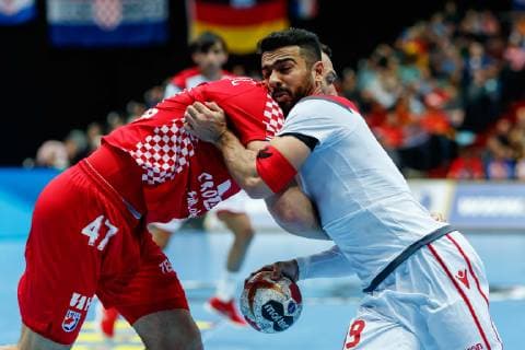 Munich Germany 16 01 2019 IHF Handball WM 2019 Group B Croatia Bahrain Jakov Vrankovic CRO and Husain Al Sajjad BHR in the total DeFodi048