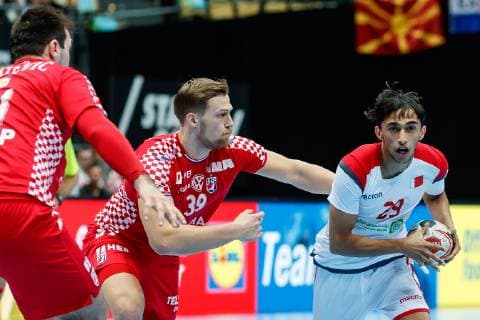 Munich Germany 16 01 2019 IHF Handball WM 2019 Group B Croatia Bahrain David Mandic CRO and Abdulla Yaseen BHR in the total DeFodi048