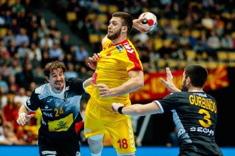 Munich Germany 16 01 2019 IHF Handball WM 2019 Group B Macedonia Spain Viran Morros ESP Filip Kuzmanovski MKD and Eduardo Gurbindo ESP in the duel DeFodi048
